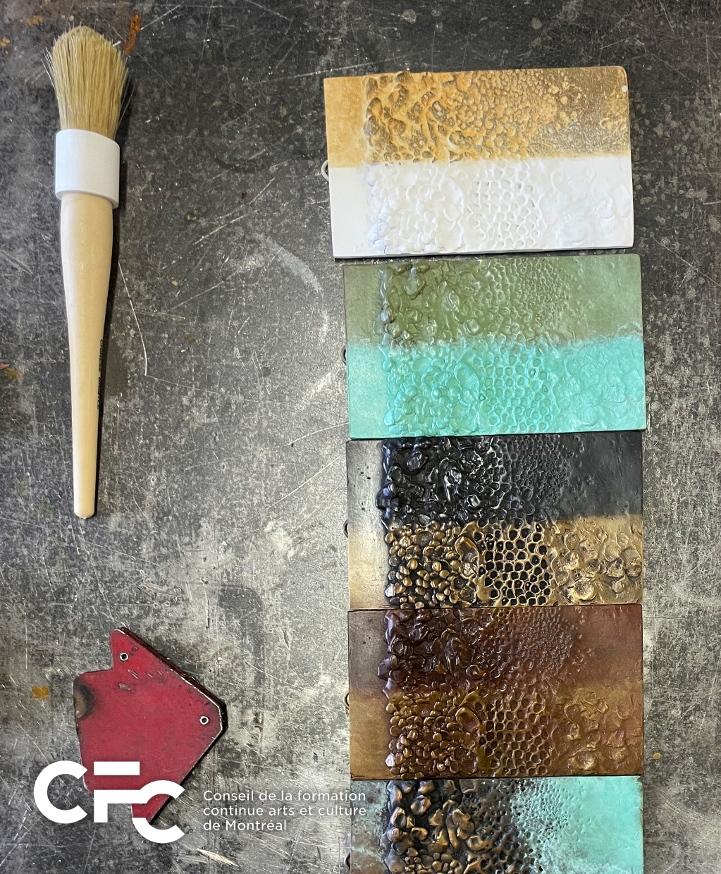 5 bronze textured panels with different coloured half and half patinas applied.